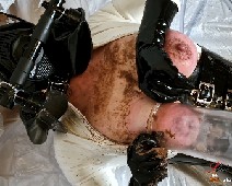 Scat Slut-Orgasma Celeste extreme scat play in white rubber catsuit and gas mask 07